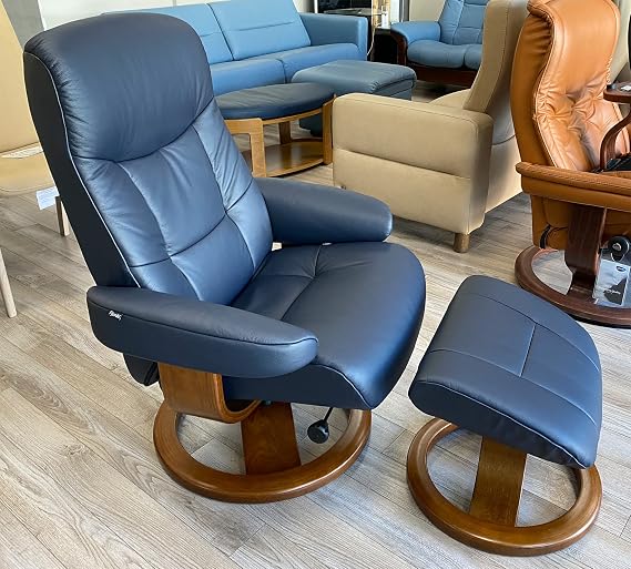 Fjords Muldal Large Leather Ergonomic Swivel Recliner Chair with Ottoman in Navy Blue NL 192 Nordic Line with a Walnut Wood Stain Base